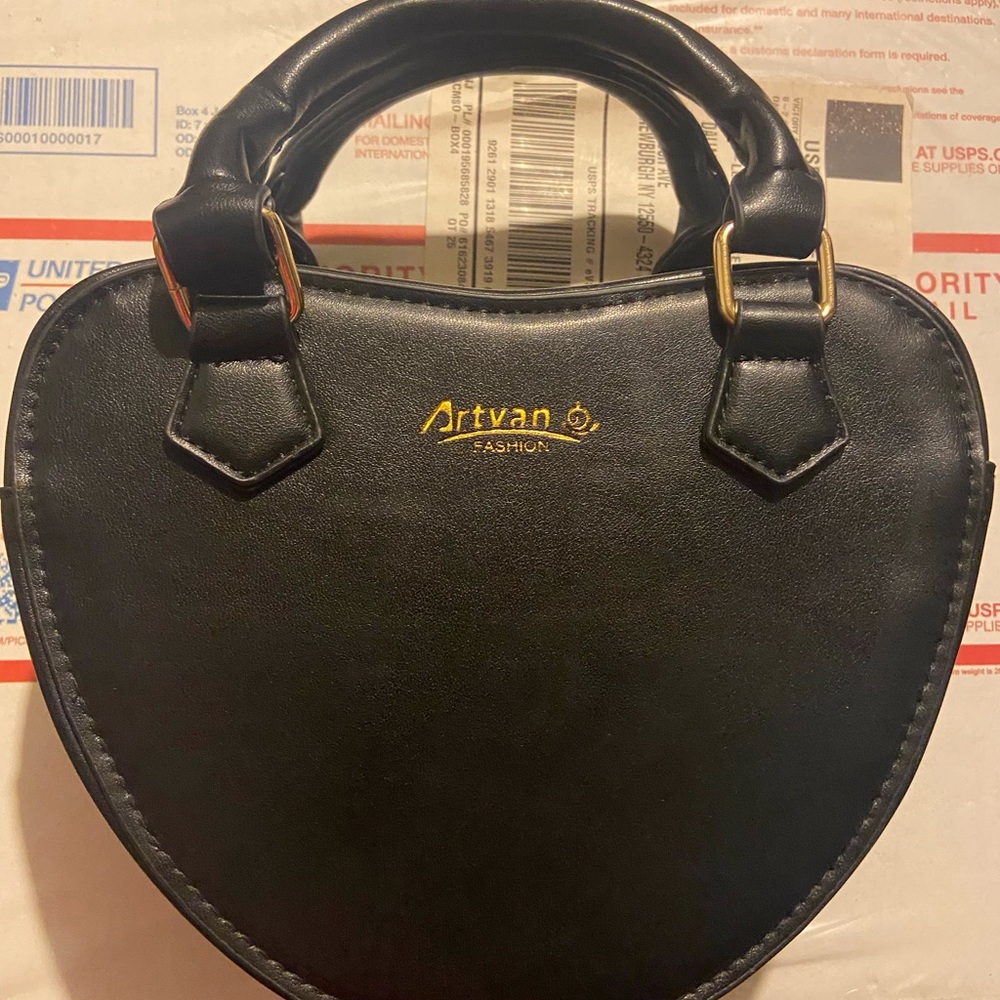Black heart shaped bag